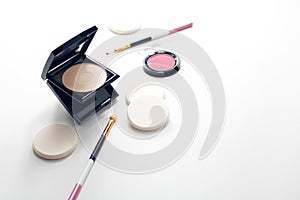 Beauty fashion of makeup cosmetic skincare powder foundation with brush black on white background,