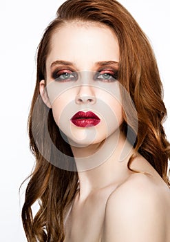 Beauty fashion model ginger hair and red makeup