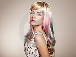 Beauty fashion model girl with colorful dyed hair