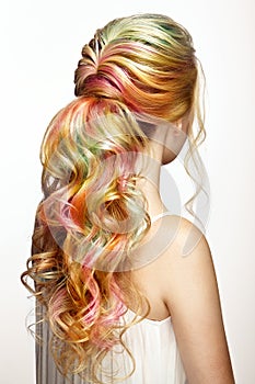 Beauty fashion model girl with colorful dyed hair