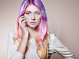 Beauty fashion model girl with colorful dyed hair