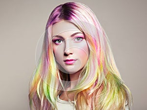 Beauty fashion model girl with colorful dyed hair