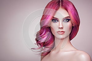 Beauty fashion model girl with colorful dyed hair