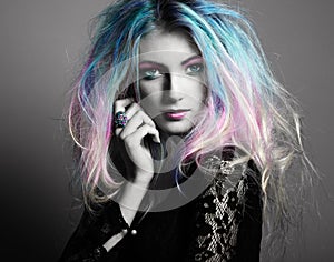 Beauty fashion model girl with colorful dyed hair