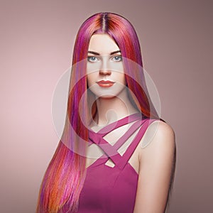 Beauty fashion model girl with colorful dyed hair