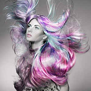 Beauty fashion model girl with colorful dyed hair