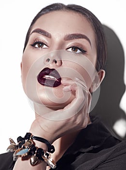 Beauty Fashion model girl with dark lips portrait, wearing stylish sexy woman portrait with perfect makeup