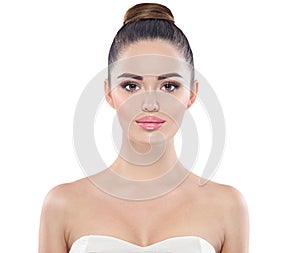 Beauty fashion model girl face isolated on white. Professional makeup for brunette with brown eyes