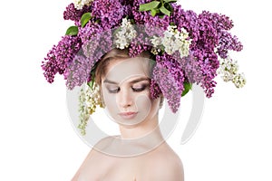 Beauty fashion model Girl with Lilac Flowers Hairstyle.