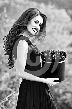 Beauty fashion model portrait. smiling girl with red roses