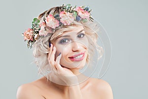 Beauty Fashion Portrait of Beautiful Model Woman with Curly Hair, Makeup and Flowers Crown