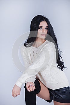 Beauty fashion portrait of young beautiful brunette girl with long black hair. Beauty face. portrait of beautiful woman with long