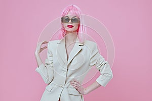 Beauty Fashion woman in White blazer pink hair Glamor Cosmetics color background unaltered