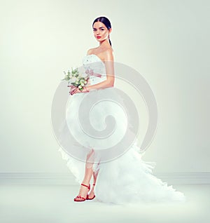 Beauty fashion young model bride in wedding white dress