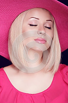 Beauty. Fashionable pretty blond woman with makeup wearing in pi