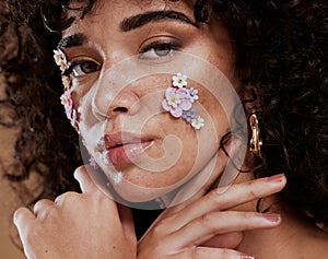 Beauty, flowers and makeup, portrait of black woman from Brazil with beautiful face on studio background. Nature, luxury