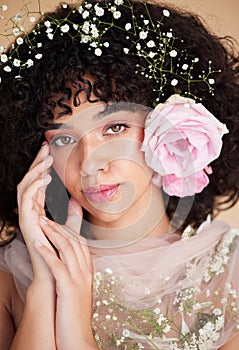 Beauty, flowers and portrait of woman with makeup, cosmetics and hair care for wellness, glamour and glow. Spring