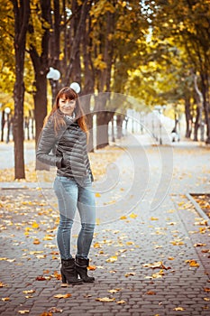 Beauty girl in autumn park
