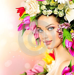 Beauty girl with flowers hairstyle