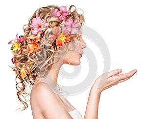 Beauty girl with flowers hairstyle