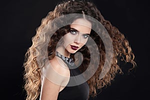 Beauty girl hair. Curly hairstyle. brunette girl with healthy lo