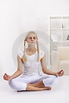 Beauty girl in lotus pose