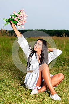 Beauty Girl Outdoors enjoying nature. Beautiful Teenage Model gi