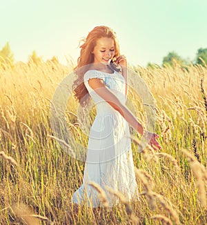 Beauty girl outdoors enjoying nature