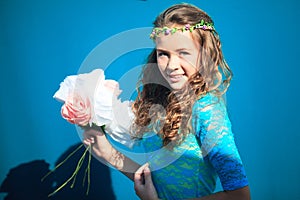 Beauty Girl Outdoors enjoying nature. Teenage Model girl running on the Spring Field, Sun Light.