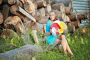 Beauty Girl Outdoors enjoying nature. Teenage Model girl running on the Spring Field, Sun Light.