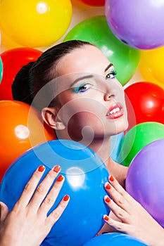 Beauty Girl Portrait with Colorful Makeup,