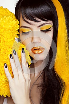 Beauty Girl Portrait with Colorful Makeup, Long Hair, Nail polish. Manicure and Hairstyle. Black and yellow Colors