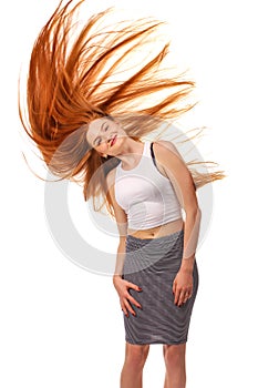 Beauty Girl Portrait. Healthy Long Red Hair. Beautiful Young Woman isolated on a white background