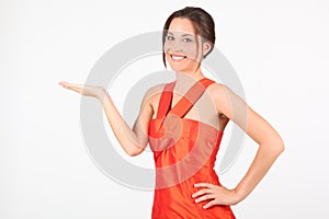 Beauty girl in red dress gesturing