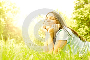 Beauty girl relaxing in nature