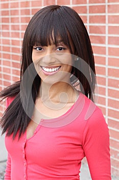 Beauty girl with straight hairstyle and nice toothy smile photo