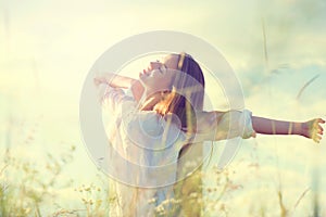 Beauty girl on summer field