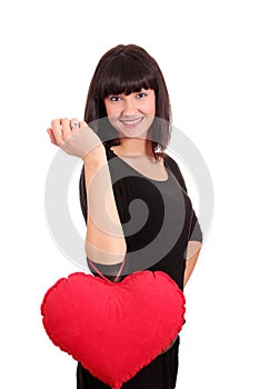 Beauty girl with valentine heart posing