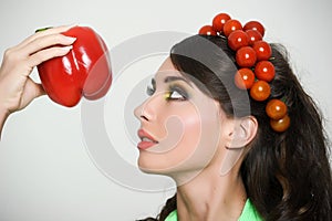 Beauty girl with Vegetables hair style. Beautiful happy young woman with vegetables on her head. Healthy food concept, diet, veget