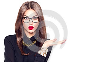 Beauty girl wearing glasses showing empty copyspace