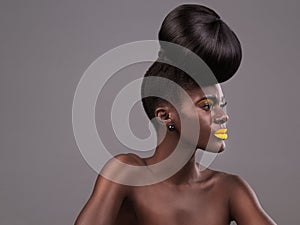 Beauty, glamour and black woman in studio with lipstick, natural cosmetics and eyeshadow on gray background. Creative