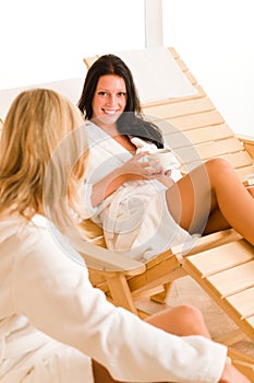 Beauty health spa two women relax talking