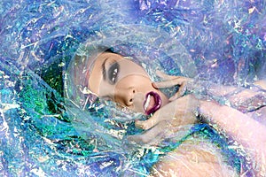 Beauty Image of a Woman Wrapped in Cellophane