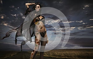 Beauty lady in the autumn scenery