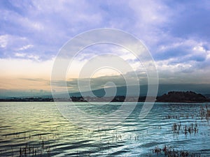 beauty landscape view from kawaguchi lake with cloudy sky and fuji mountain background (soft focus) from japan