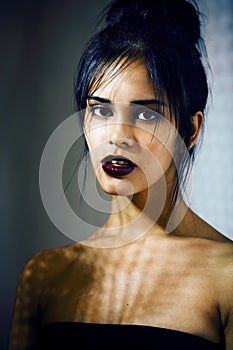 beauty latin young woman in depression, hopelessness look, fashi
