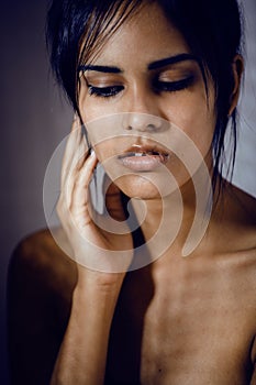 Beauty latin young woman in depression, hopelessness look, fashion makeup modern