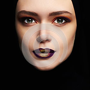 Beauty make-up.beautiful woman face like a mask. female mask isolate on black