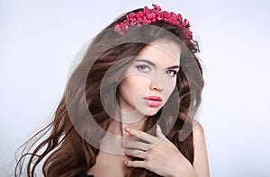 Beauty Makeup. Beautiful young woman with chaplet in head, skin photo