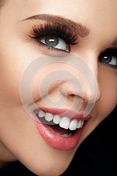 Beauty Makeup. Closeup Beautiful Woman Face With Perfect Smile